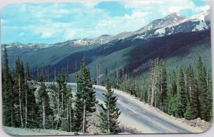 Snow capped peaks from switchbacks on Berthoud Pass, Colorado