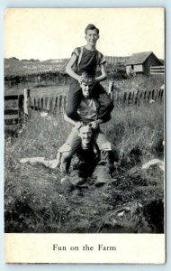 FUN on the FARM FARMER & 2 Sons Piled on Top 1910  Postcard