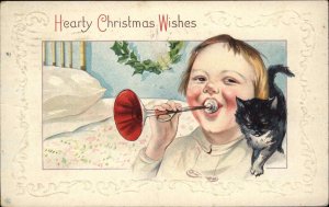CHRISTMAS Little Boy Plays Toy Trumpet w Kitten c1910 Postcard