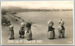 DOLLS at COLWYN BAY UK ANTIQUE REAL PHOTO POSTCARD RPPC PHOTOMONTAGE collage