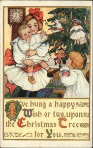 Christmas Big Sister with Young Siblings Chinese Doll c1910 Vintage Postcard