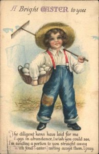 Easter Little Farmer Boy with Rake and Eggs c1910 Vintage Postcard