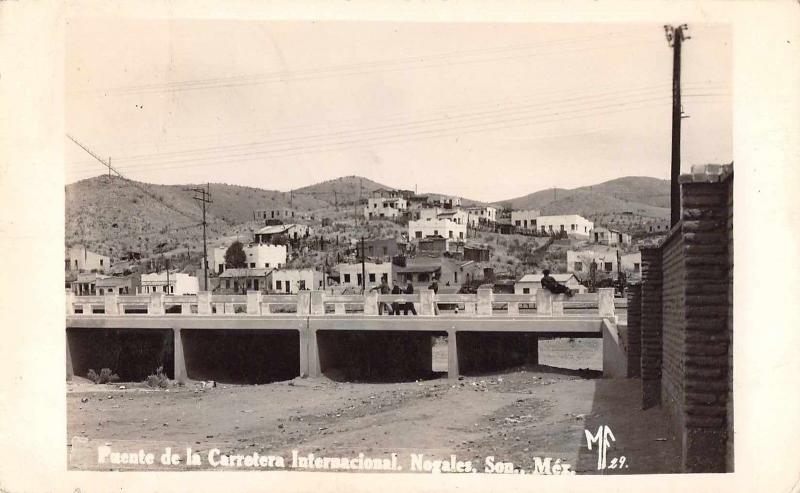 Nogales Mexico Puente de la Carretera Internacional Real Photo Postcard J63106 