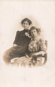 STUDIO PORTRAIT-2 YOUNG WOMEN~FAIR POSTAL STUDIO REAL PHOTO POSTCARD