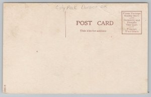 Durant Oklahoma~City Park~Crowds Camp under Trees~Autos~Wagons~c1910