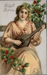 CHRISTMAS Beautiful Woman Plays Mandolin c1910 Postcard