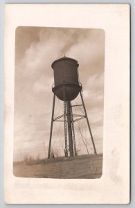 RPPC  Large Water Tower  Kid Hangs On Wire  Postcard P25