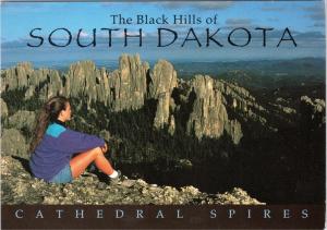 Female hiker viewing the Cathedral Spires of the Black Hills South Dakota