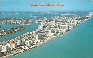 US4 US FL Famous Hotel strip Miami Florida 1979 Goodyear Blimp aerial view