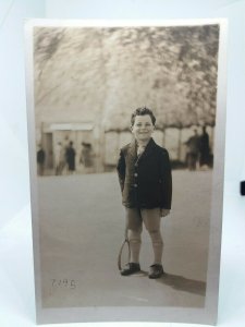 Young Boy in Tweed Jacket Ready to Play Tennis  Vintage Postcard 1940s WW2