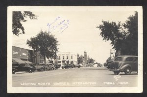 ONEILL NEBRASKA DOWNTOWN STREET SCENE OLD CARS O'NEILL REAL PHOTO POSTCARD