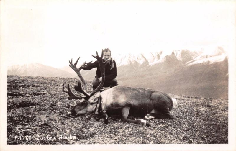 ALASKA CARIBOU HUNTER WITH RIFLE REAL PHOTO POSTCARD c1940s