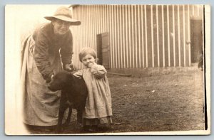 RPPC  Farmer Lady With Dog and Child   Postcard  c1910