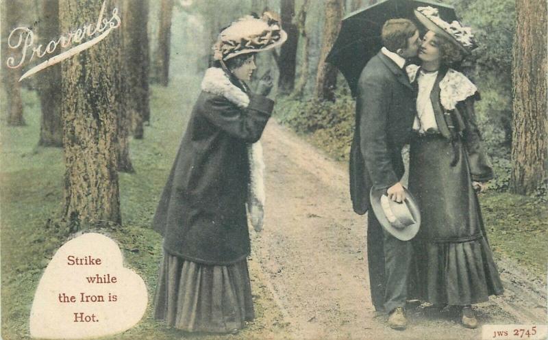 British proverbs postcard  Strike while the Iron is Hot  lovers kiss