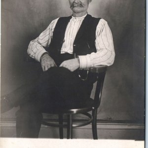 c1910s Handsome Old Mustache Man RPPC Sitting Chair Real Photo Vest Funny A159