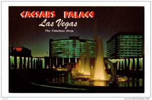 LAS VEGAS, Nevada; Caesars Palace at night on the Fabulous Strip, Fountain, 4...