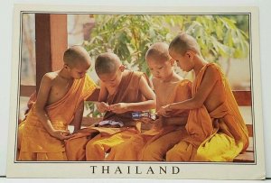 Thailand A Group of Young Buddhist with Toy Robot Postcard F20