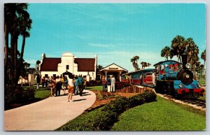 Tampa Florida~Busch Gardens Passengers Leaving Trans-Veldt Train~Vtg Postcard