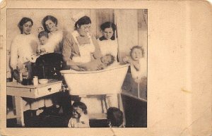 Nurse Giving a Baby a Bath Red Cross Occupation, Nurse 1916 