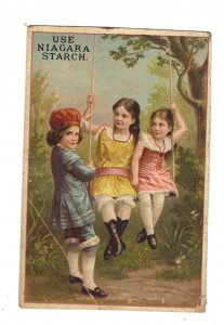 Victorian Trade Card Niagara Starch Girls in Fancy Dresses on Swing