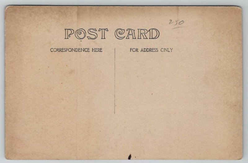 RPPC Darling School Children Class Photo Bad Photographer Postcard J24