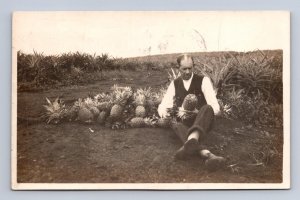 RPPC MAN WITH PINEAPPLES HAWAII REAL PHOTO POSTCARD 1916