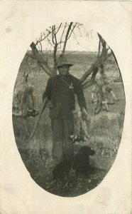 C-1910 Hunter String dead rabbits Frane Like RPPC Photo Postcard 20-9515