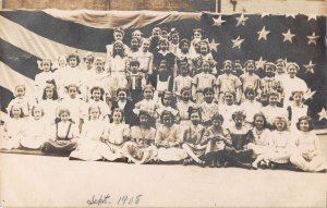 1908 September Children with US Flag Real Photo Vintage Postcard AA44381