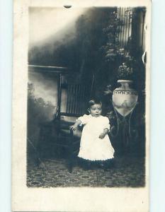 Pre-1918 rppc CHILD BY ANTIQUE CHAIR Sioux City Iowa Iowa IA j6175