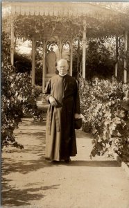 Catholic Priest In Garden Beautiful Gazebo and Statue Real Photo Postcard U2