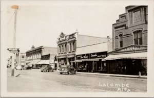 Lacombe Alberta Meat Market Mens Wear Day's Block Building RPPC Postcard E98