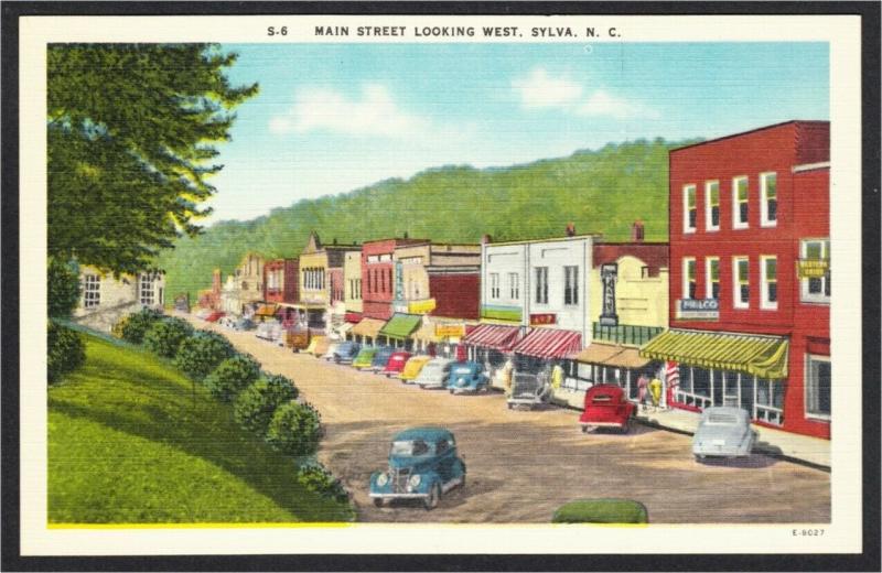 Sylva NC Main Street Looking West with Stores and Cars 1940s-50s Linen Postcard