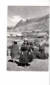 B81680 view of the villagepuno iehu folklore types peru front/back image