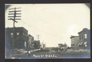 RPPC DIKE IOWA DOWNTOWN MAIN STREET SCENE REAL PHOTO POSTCARD IA. STORES