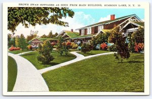 Brown Swan Cottages As Seen From Main Building Schroon Lake New York NY Postcard