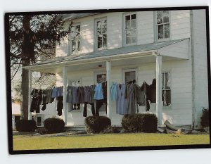 Postcard Amish Seasons Simple Clothesline of an Amish Family