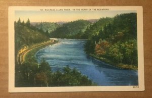 VINTAGE UNUSED LINEN PC RAILROAD ALONG THE RIVER  IN THE HEART OF THE MOUNTAINS