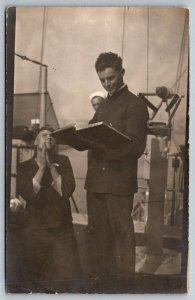 1920  RPPC USS Pittsburgh  US Navy Chaplain Preaching  Sailor Praying  Postcard