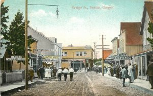 c1910 Postcard; Seaside OR Bridge Street Scene, Business Signs, Clatsop Co.