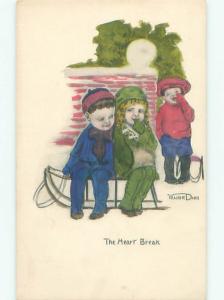 Pre-Linen signed GIRL AND BOY SITTING ON TOBOGGAN SLED AC1714