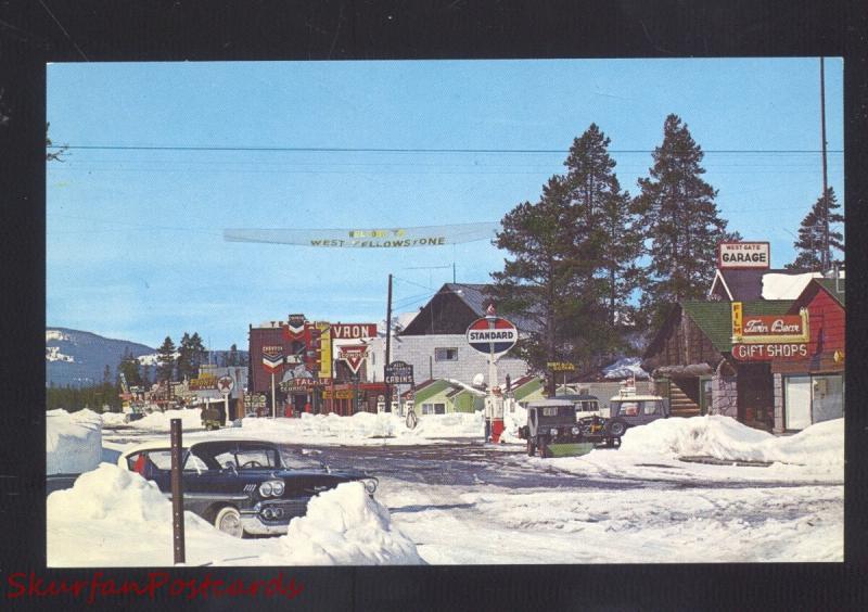 WEST YELLOWSTONE MONTANA DOWNTOWN STREET SCENE WINTER SNOW OLD POSTCARD