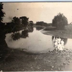 c1910s 4th of July Picnic RPPC Kids in Pond +Flag Real Photo Plentywood, MT A125