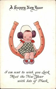 New Year Cute Little Girl on Lucky Horseshoe c1910 Vintage Postcard