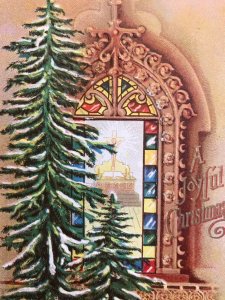 C.1913 Embossed Postcard Snow Covered Tree Gilt Framed Church Window