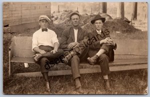 K50/ Interesting RPPC Postcard c1910 Americana Good-Looking Men Bench 375