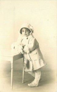 C-1910 Girl winter coat Outfit muff RPPC Photo Postcard 21-8667