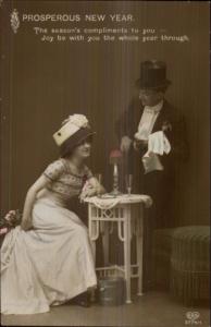 New Year - Fancy Couple Drinking Champagne c1910 Tinted Real Photo Postcard