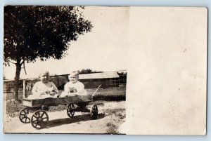 Little Boys Postcard RPPC Photo Riding On Toy Wagon c1910's Unposted Antique