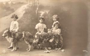 \Litle children, flowers cart, dog\ Anitique French Postcard