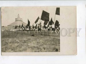 401168 AUSTRIA AVANT-GARDE boys w/ flags athletic parade RPPC